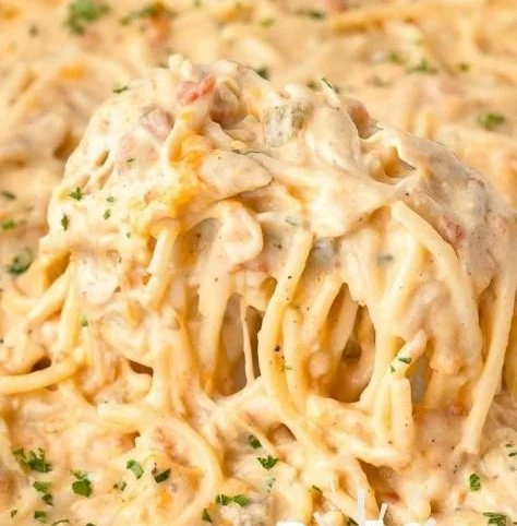 Delicious cheesy casserole served in a baking dish with melted cheese and toppings