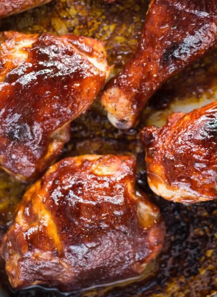 Delicious oven baked BBQ chicken served on a plate