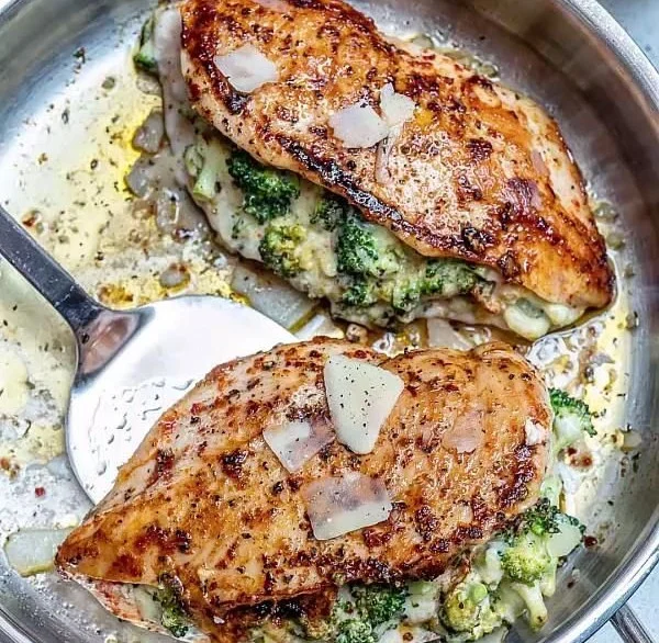 Deliciously cooked stuffed chicken breasts with herbs and cheese
